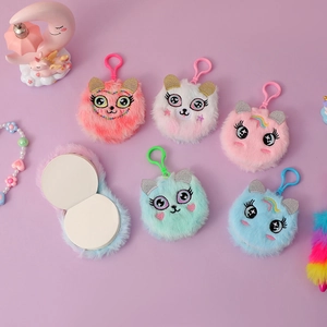 Mini round plush animal notebooks with colorful faux fur covers and secure lobster clips