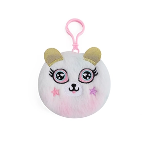 Detail of plush unicorn keychain with heart-eyed embroidery and pink gradient faux fur