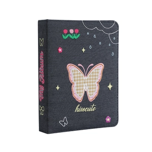 A5 denim photo album with colorful butterfly embroidery and rainbows on gray fabric