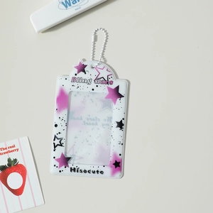 Macro shot of 3-inch transparent PVC photocard holder with star patterns and bead chain