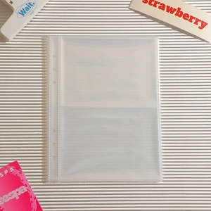 Detailed view of A5 binder sleeves with laser star patterns and double pocket design