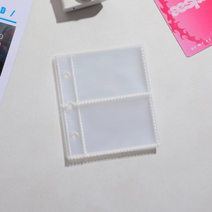 Macro view of clear PVC 3-hole photo sleeve for photocards with two storage slots