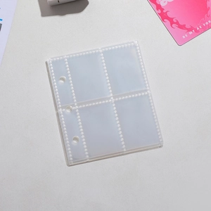 Detail view of transparent 4-pocket PVC binder sleeves with 3-hole punched margin for cards