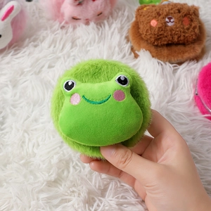Detailed view of creative plush green frog cartoon handheld mirror with soft embroidery