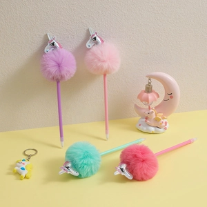 Unicorn pens with colorful plush pom-poms and metallic unicorn heads for school students