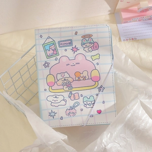 Detail of A5 cartoon binder featuring blue grid pattern and cute pink animal illustrations