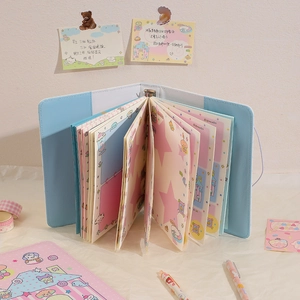 Detail of light blue A5 loose-leaf journal set with cute inner pages and stationery