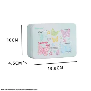Detail view of a light blue tin box with colorful butterflies and size 13.8x10x4.5cm