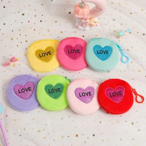 Seven colorful round plush coin purses with love embroidery and glitter heart patches