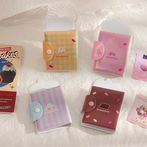 Flat lay of four HISOCUTE 3-inch photo albums with cupcake and dog patterns