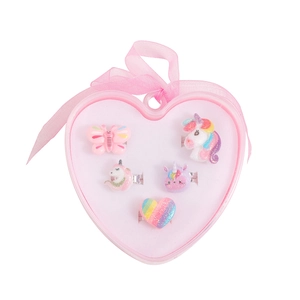 Detailed view of 5-piece cartoon unicorn ring set in a pink heart-shaped gift box