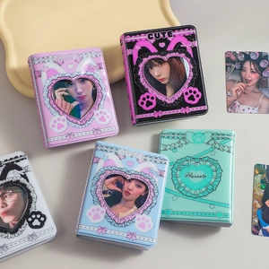 Close-up of colorful heart-hollow photo albums for K-pop photocards in various pastel colors