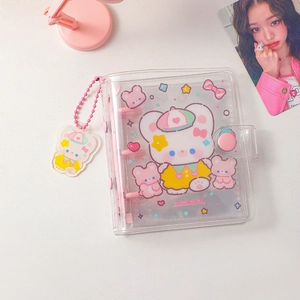 Detail of 3-hole mini PVC photocard binder with cute bear pendant and pink button clasp
