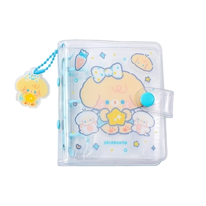 Detail of a 3-hole mini photo album with a cute cartoon puppy and blue bead chain pendant