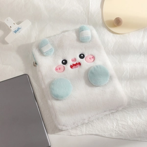 Detailed view of the soft white plush tablet sleeve with cute embroidered cartoon face