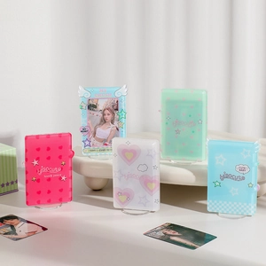 Detail of colorful star acrylic photo card frames with cute heart and wing patterns
