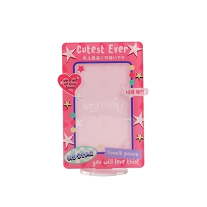 Pink acrylic photocard display holder with star and heart patterns and clear base