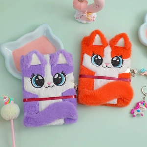 Detailed close-up of plush cat notebooks in purple and orange with cute 3D cat ears