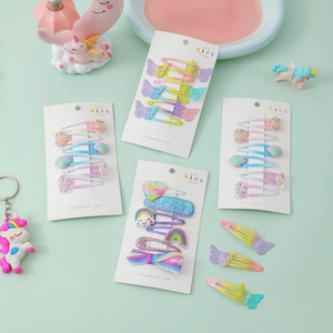 Set di 6 mollette glitterate per bambine con unicorni, arcobaleni e farfalle colorate