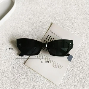 Detail view of small frame sunglasses with silver rivets and size dimensions displayed