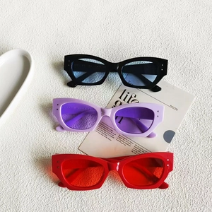 Cat eye small frame sunglasses in black, purple, and red for fashion and UV protection