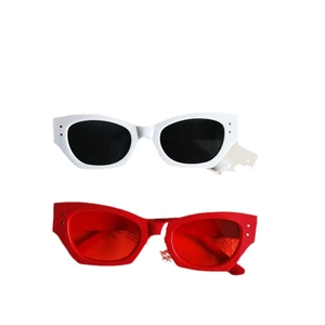 Retro cat eye sunglasses with metal rivet accents in white and red color options
