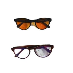 Vintage cat eye sunglasses in black with orange lenses and brown frame eyewear