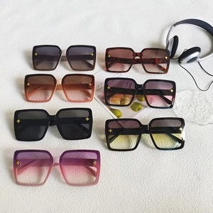 Fashion oversized square sunglasses in multiple colors with gold cross metal detailing
