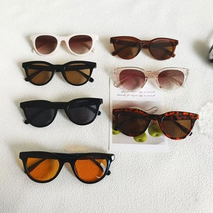 Vintage cat eye sunglasses collection with varied frame colors and UV400 lenses
