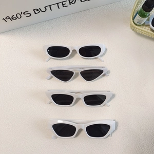 Retro white oval sunglasses set with cat-eye frames and UV protection lenses