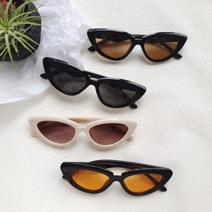 Retro cat-eye triangle sunglasses set in black, white, and tea colors for women