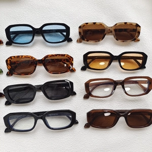 Retro rectangular sunglasses in various colors featuring wide frames and hip-hop style