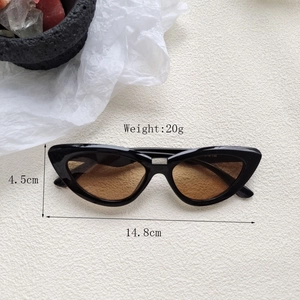 Detailed view of black cat-eye sunglasses with dimensions 14.8cm width and 4.5cm height
