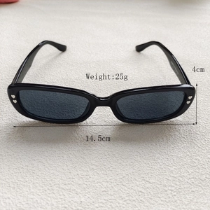Retro black square sunglasses with silver heart accents and dark grey lenses for women