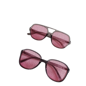 Retro square sunglasses set with gray transparent frames and vibrant pink tinted lenses