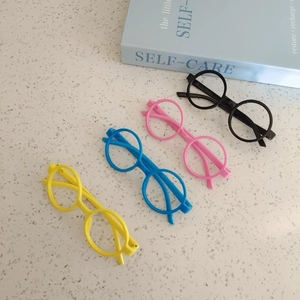 Set of four colorful round frame children's glasses in yellow, blue, pink, and black