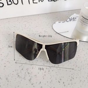 Detail view of foldable white kids sunglasses showing 22g weight and compact hinge design