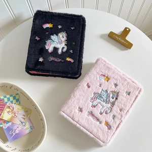 Plush unicorn 3-inch photo album binder in pink and black with soft faux fur cover