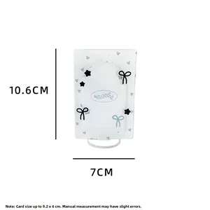 Detailed dimensions of white acrylic heart photo card holder with bow and star decor