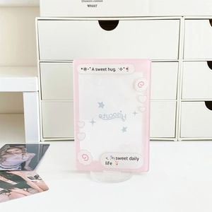 Pink acrylic photo holder with heart patterns and base for displaying star cards