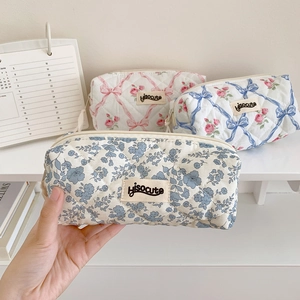 Quilted floral pencil case set for students with cute bow patterns and zipper closure