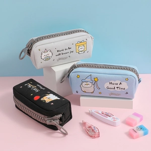 Detailed stack of cartoon canvas pencil cases with large zippers and cute animal prints