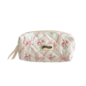 Quilted floral pencil case with pink rose pattern and secure zipper closure for students