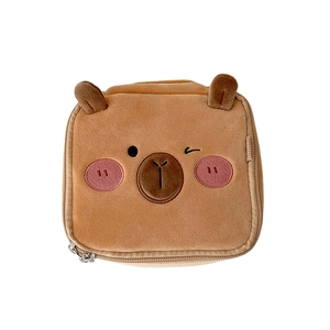Cute brown plush puppy makeup bag with 3D ears and embroidered face on white background