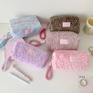 Plush leopard print cosmetic bags in five colors with wristlet strap and zipper