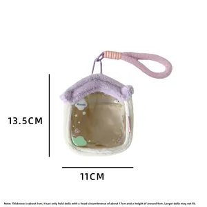 Detail showing 13.5x11cm dimensions for purple house-shaped plush doll storage bag