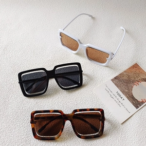 Detailed top view of fashionable oversized hollow-frame sunglasses in three colors