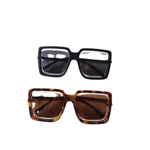Fashion oversized square sunglasses in black and tortoiseshell finish with metal trim