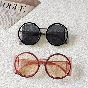 Fashionable oversized round frame sunglasses for men and women in black and tea pink
