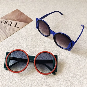 Fashionable oversized round-frame sunglasses with bold avant-garde geometric colorful design